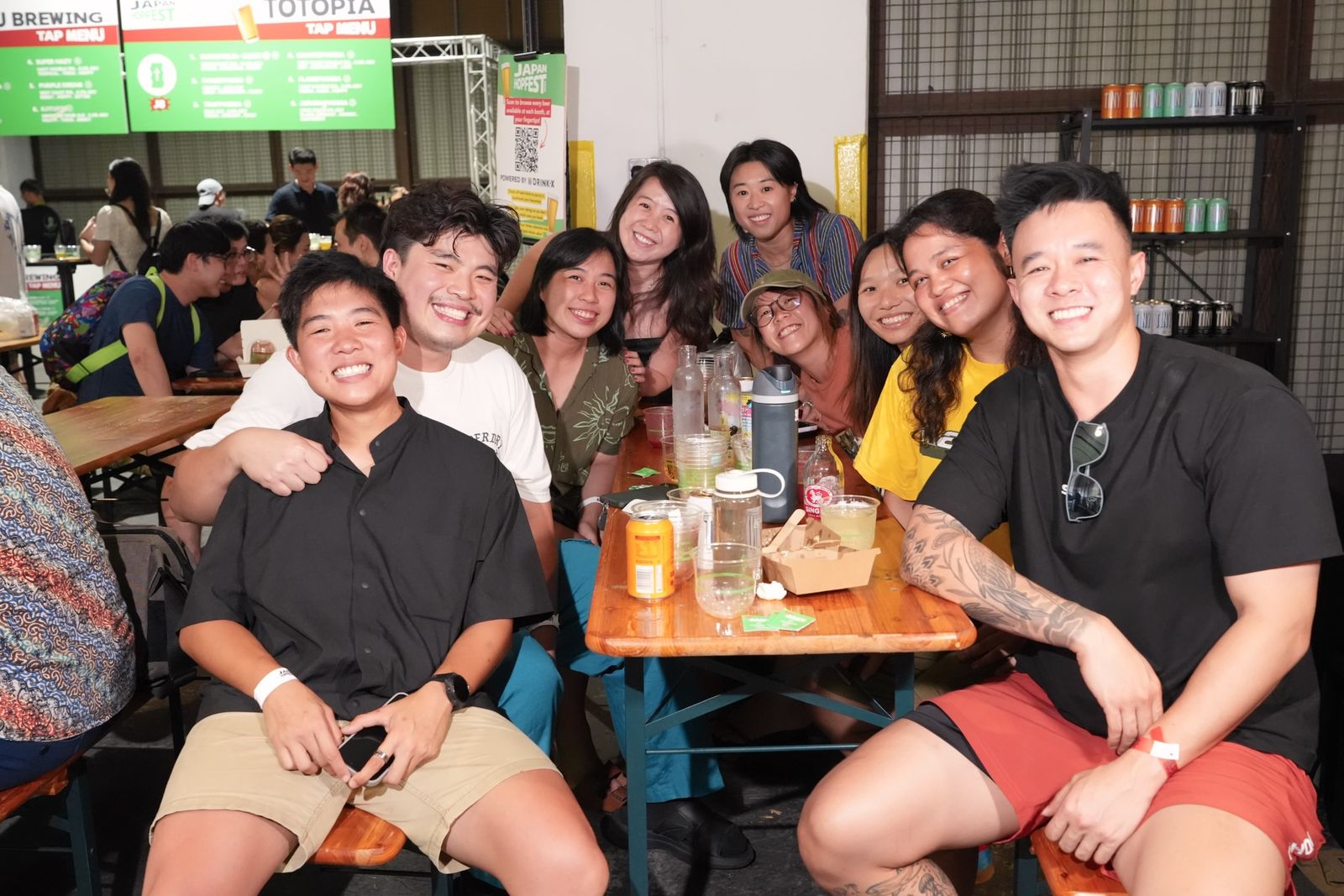 A big group grinning around the table