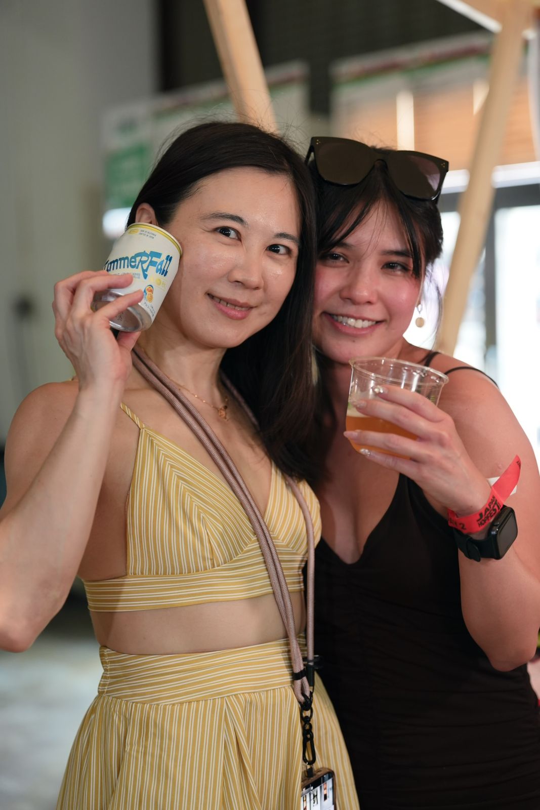 Two friends raising their cups