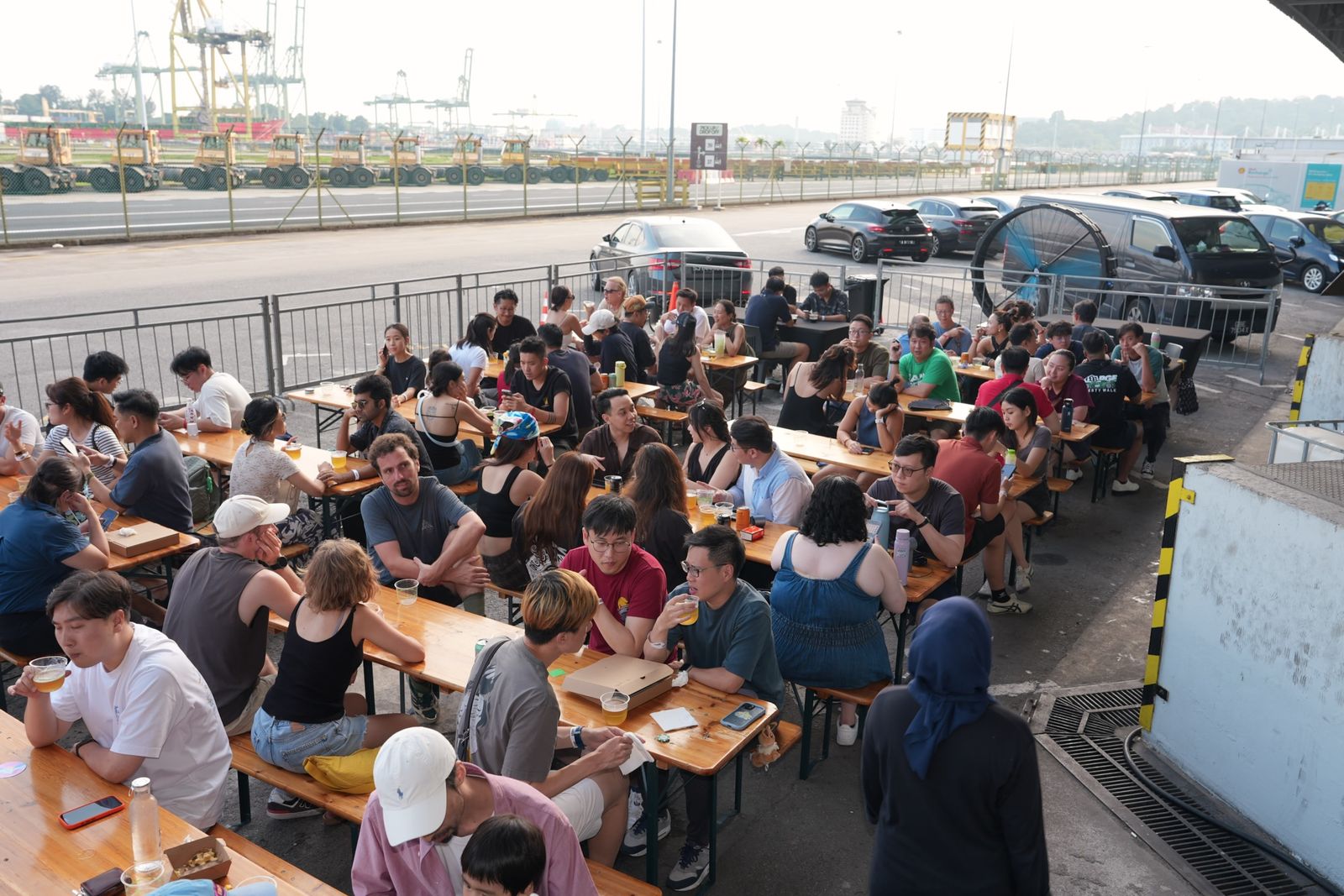 Packed waterfront seating at the festival