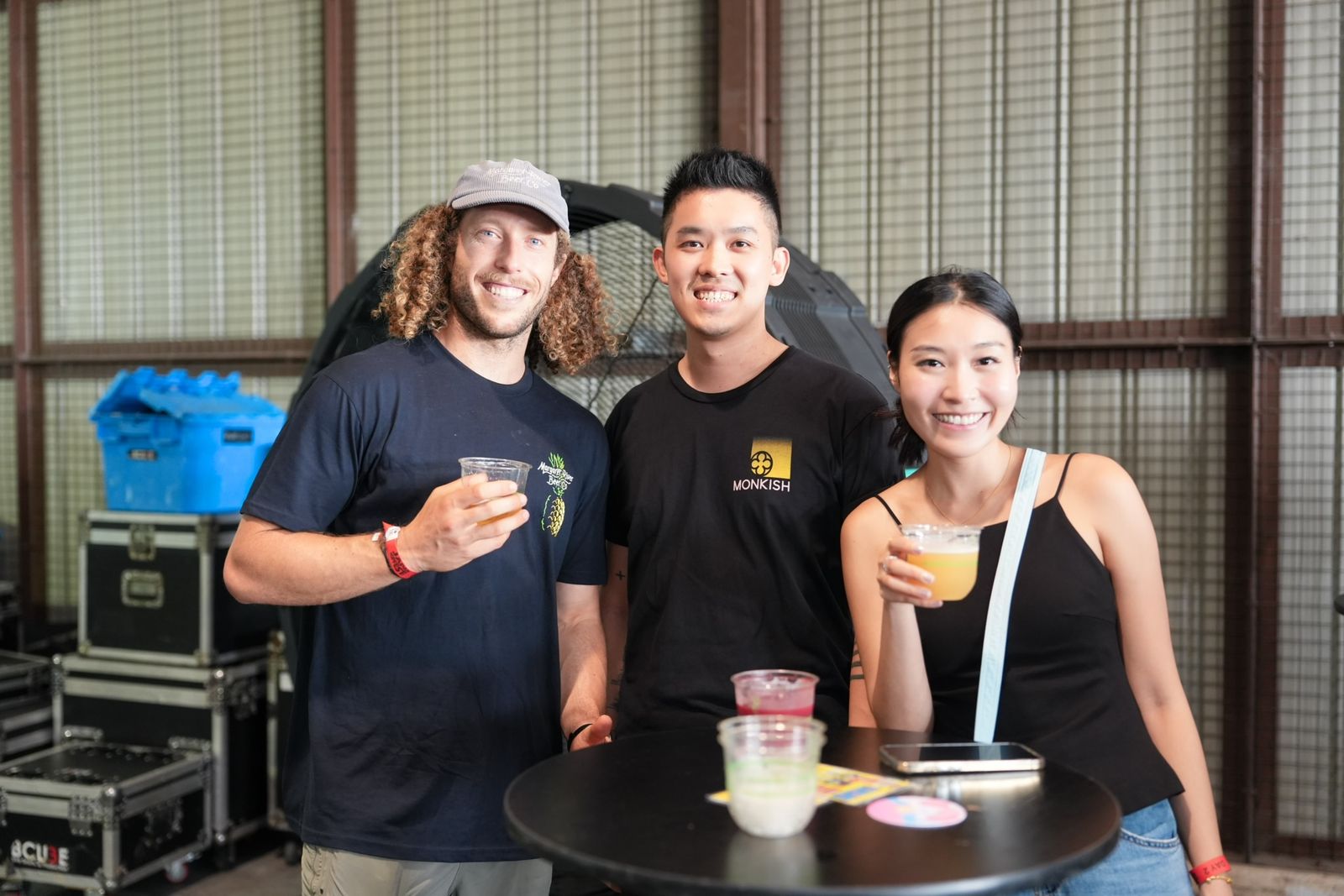 Brewers and guests sharing a beer